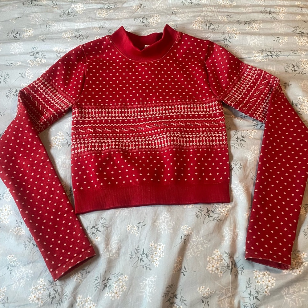 Red Fabletics sweater. Size XS